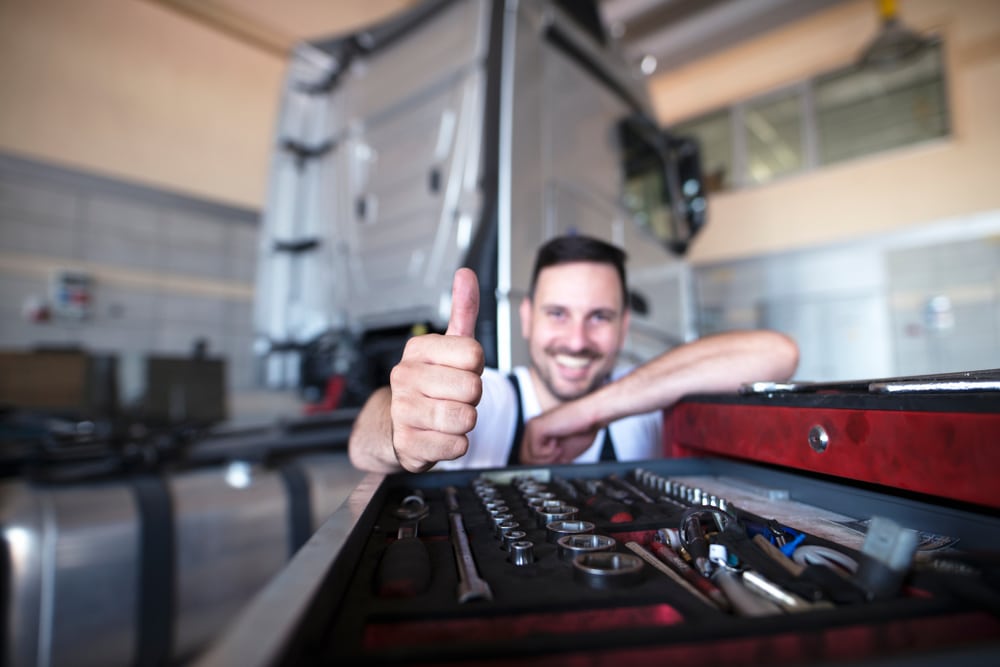 Maintenance technician giving the thumbs up