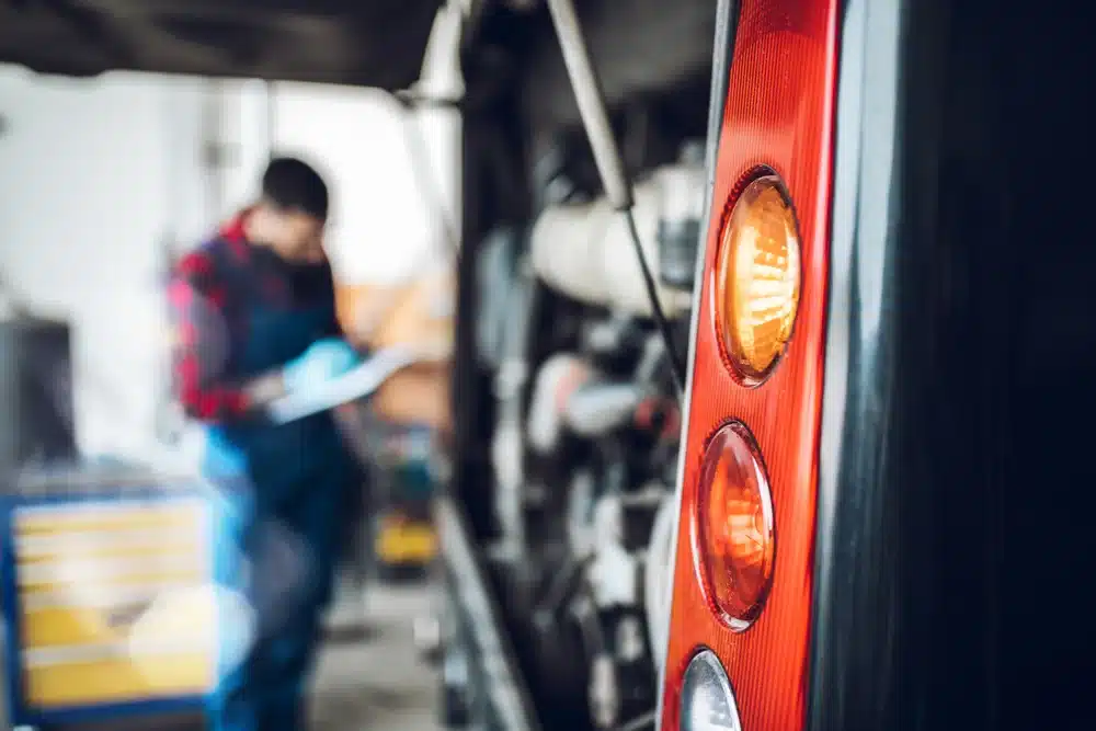fleet mechanic doing fleet vehicle dot inspection and safety inspection